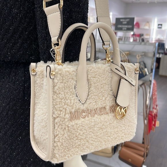 Michael Kors Mirella Extra-Small Sherpa XS SHOPPER XBODY
SHEARLING Crossbody - Picture 10 of 16